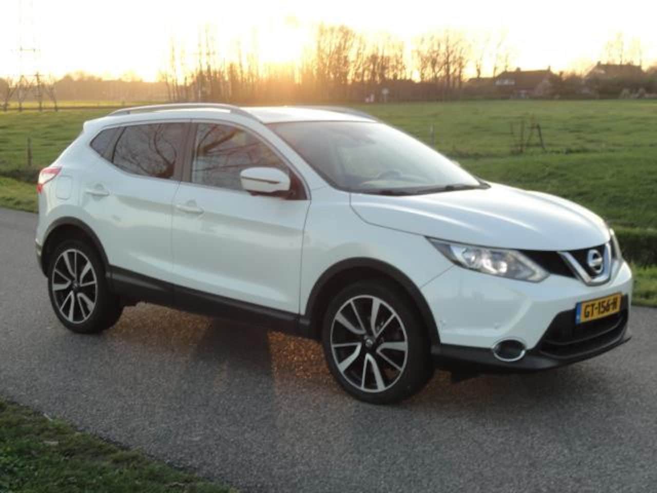 Nissan Qashqai - 1.2Tekna AUTOMAAT Full ECC+NAVIG+360*CAMERA+LED - AutoWereld.nl