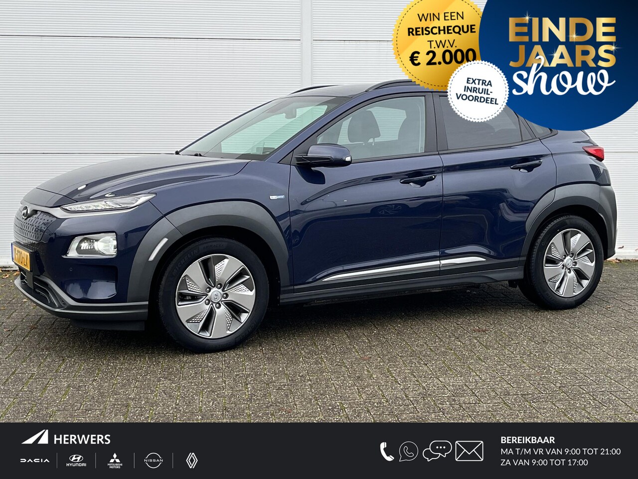 Hyundai Kona Electric - EV Limited 64 kWh / Trekhaak / Cruise control adaptief met Stop&Go en stuurhulp / Achterba - AutoWereld.nl