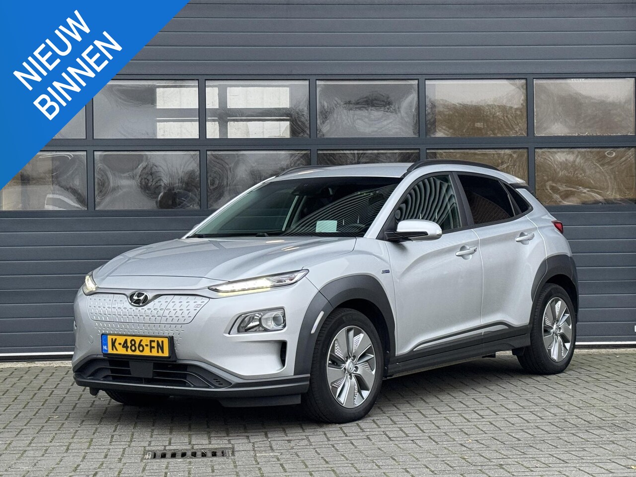 Hyundai Kona Electric - EV FASHION 64 KWH I 3 FASE I 100% SOH I P-CAMERA I AUTOMAAT I APPLE CARPLAY - AutoWereld.nl