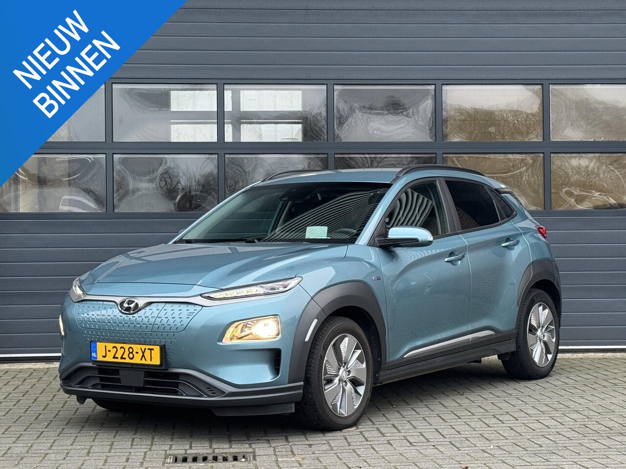 Hyundai Kona Electric - EV FASHION 64 KWH I 3 FASE I 100% SOH I P-CAMERA I AUTOMAAT I APPLE CARPLAY - AutoWereld.nl