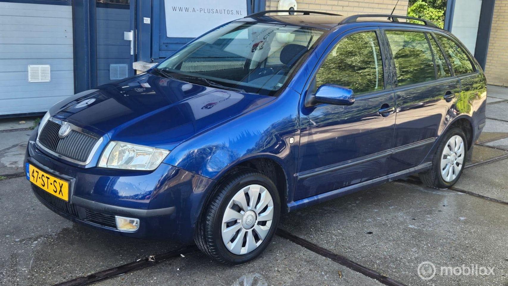 Skoda Fabia Combi - 1.4-16V Spirit+ - AutoWereld.nl