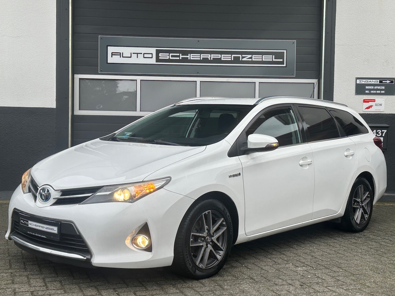 Toyota Auris Touring Sports - 1.8 Hybrid Aspiration | AIRCO | CAMERA | RUIM | - AutoWereld.nl