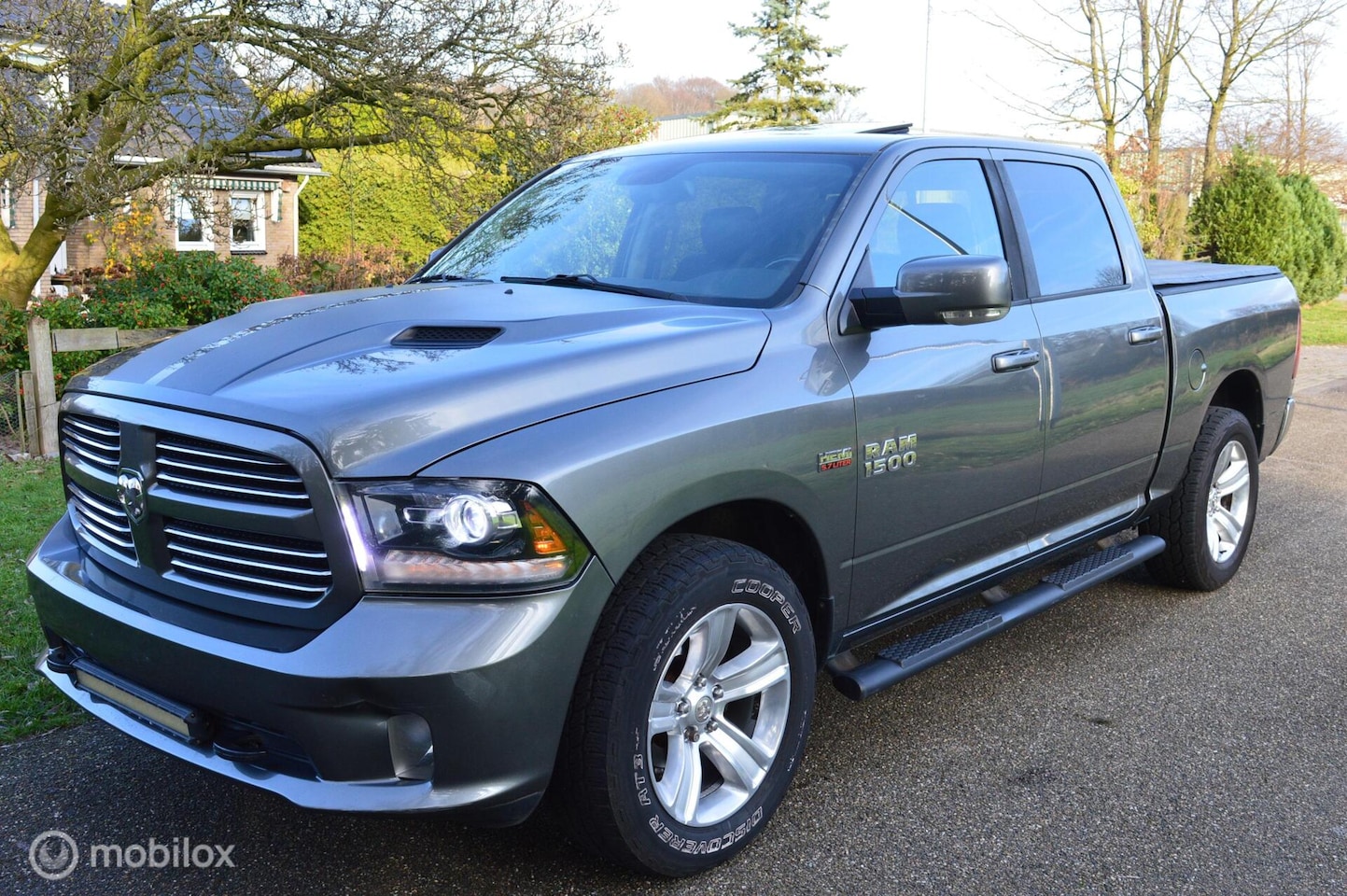 Dodge Ram 1500 - 4X4 5.7 V8 4x4 Quad Cab 6'4 LPG G3 / EXPORT - AutoWereld.nl
