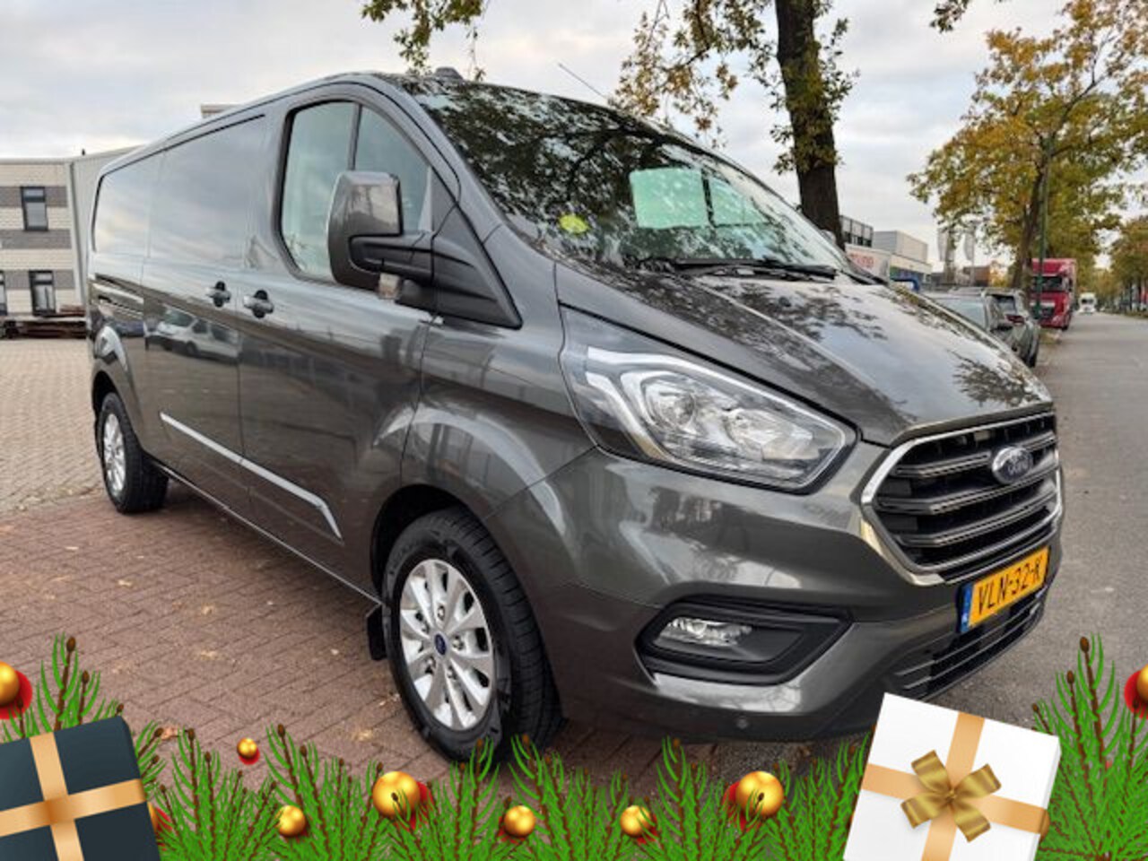 Ford Transit Custom - 300 2.0 TDCI 130pk L2 H1 Limited Automaat 3persoons Airco/ECC,Navigatie,Camera 1e Eigenaar - AutoWereld.nl