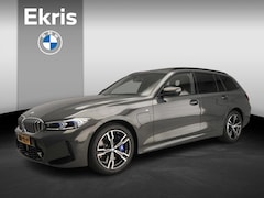 BMW 3-serie Touring - 330e | M-Sportpakket | LED | HUD | Schuifdak | Active Cruise | Trekhaak | DAB | Hifi speak