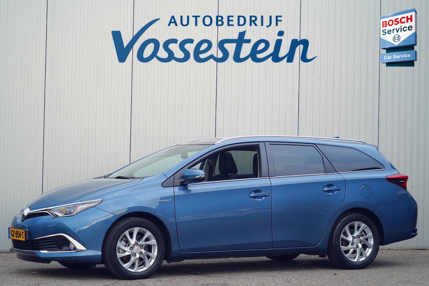 Toyota Auris Touring Sports - 1.8 Hybrid Lease pro / 1e Eigenaar / 32dkm NAP / Pano / Navi / Cruise / Camera - AutoWereld.nl