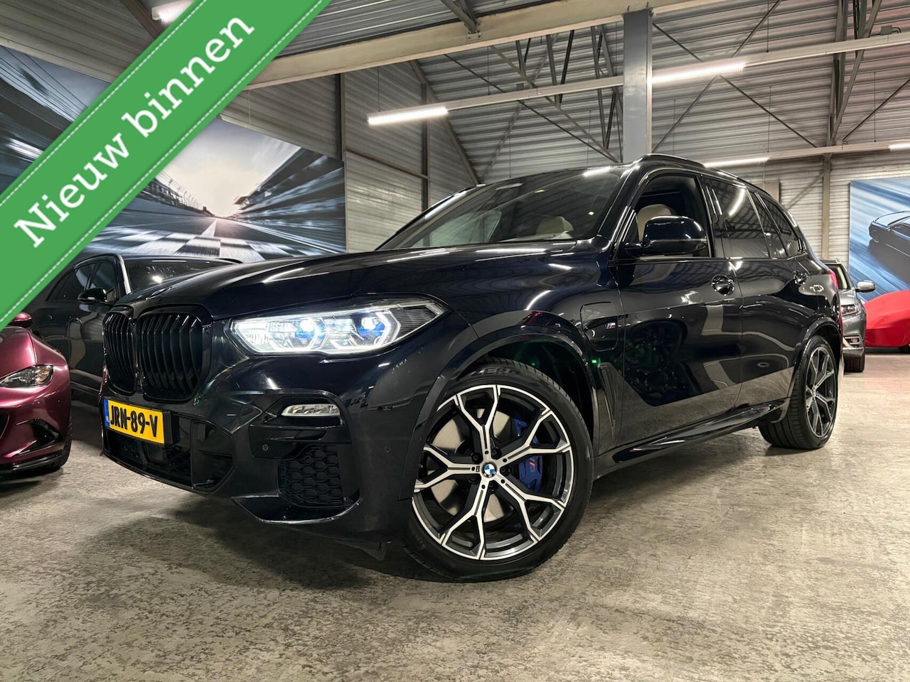 BMW X5 - xDrive45e H.E. | M-Sport | Pano | HUD | Achteras | Laser - AutoWereld.nl
