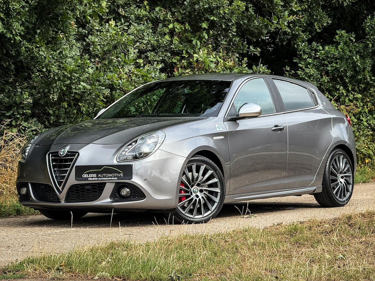 Alfa Romeo Giulietta - 1.7 TBi Quadrifoglio Verde | Clima | Cruise | Navi | DAB | Grigio Magnesio | PDC | Sportst - AutoWereld.nl