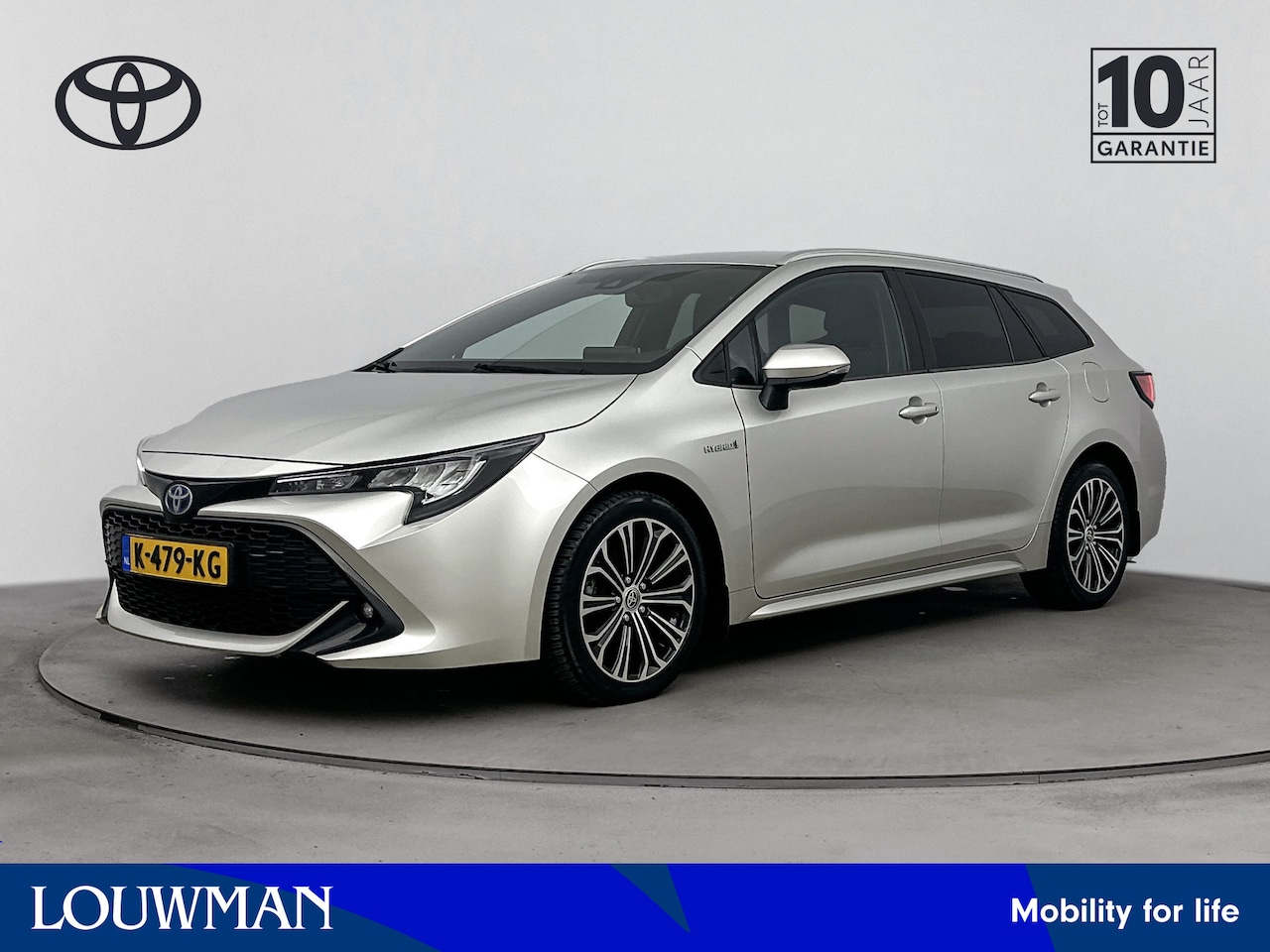Toyota Corolla Touring Sports - 1.8 Hybrid Dynamic | 1E Eig! | Parkeercamera Achter | Stoelverwarming | Draadloze Telefoon - AutoWereld.nl