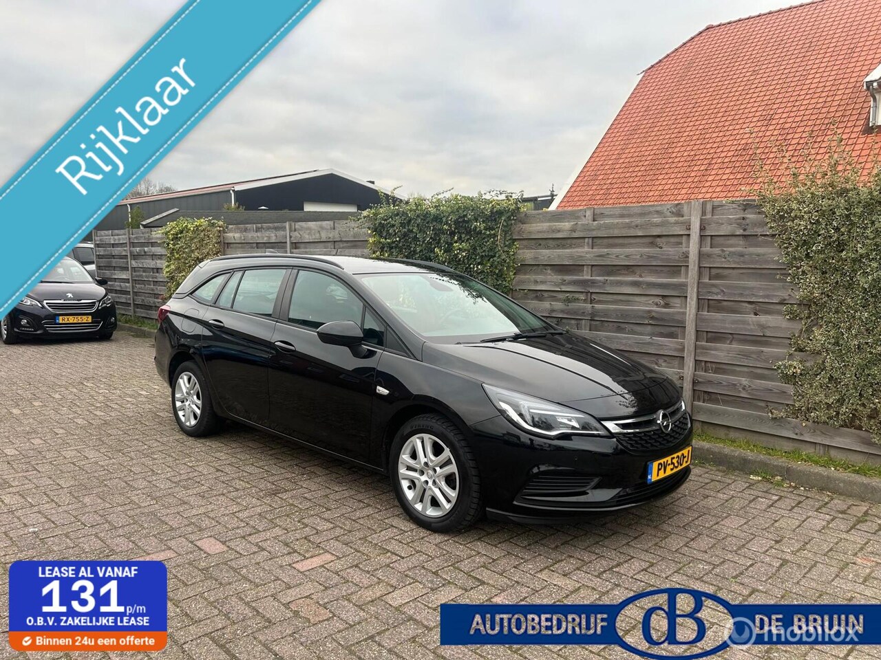 Opel Astra Sports Tourer - 1.0 Online Edition Navigatie Trekhaak - AutoWereld.nl