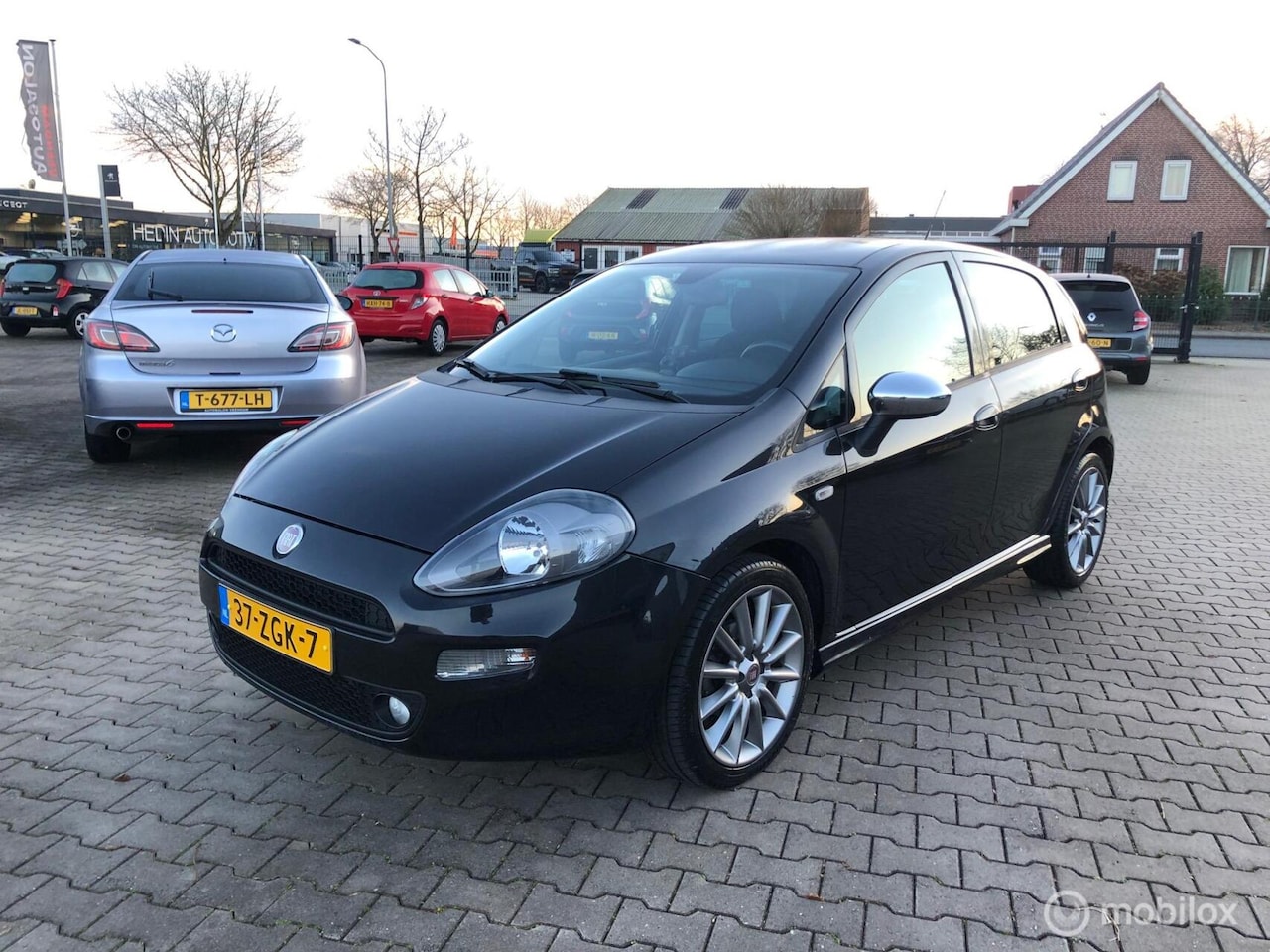 Fiat Punto Evo - 5DRS SPORT NAVI AIRCO ECC LMV ..105.380 N.A.P - AutoWereld.nl