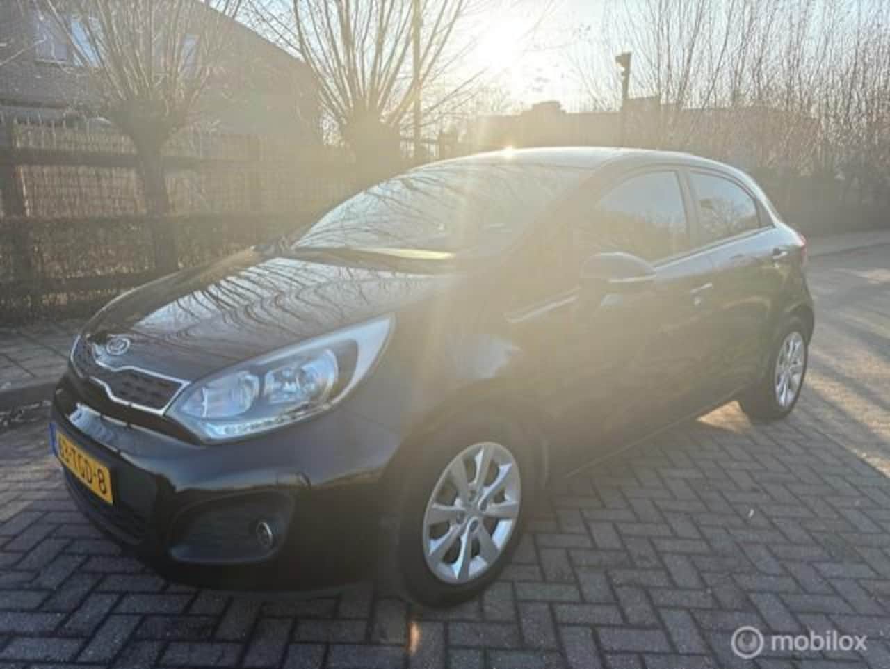 Kia Rio - 1.2 CVVT Plus Pack Black - AutoWereld.nl