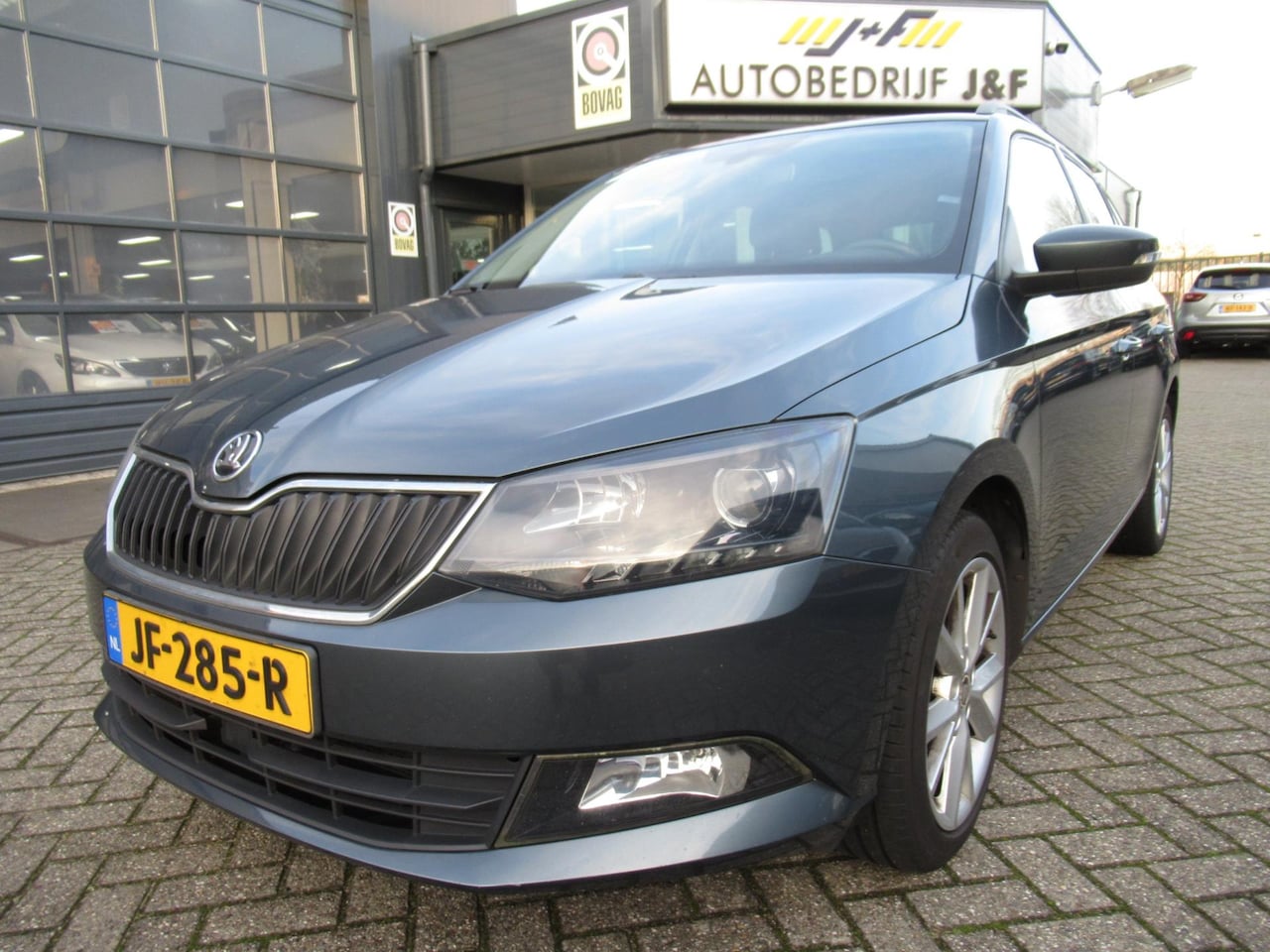 Skoda Fabia Combi - 1.2 TSI JOY / 1e EIG / PDC / Stoelverwarming / Bluetooth - AutoWereld.nl