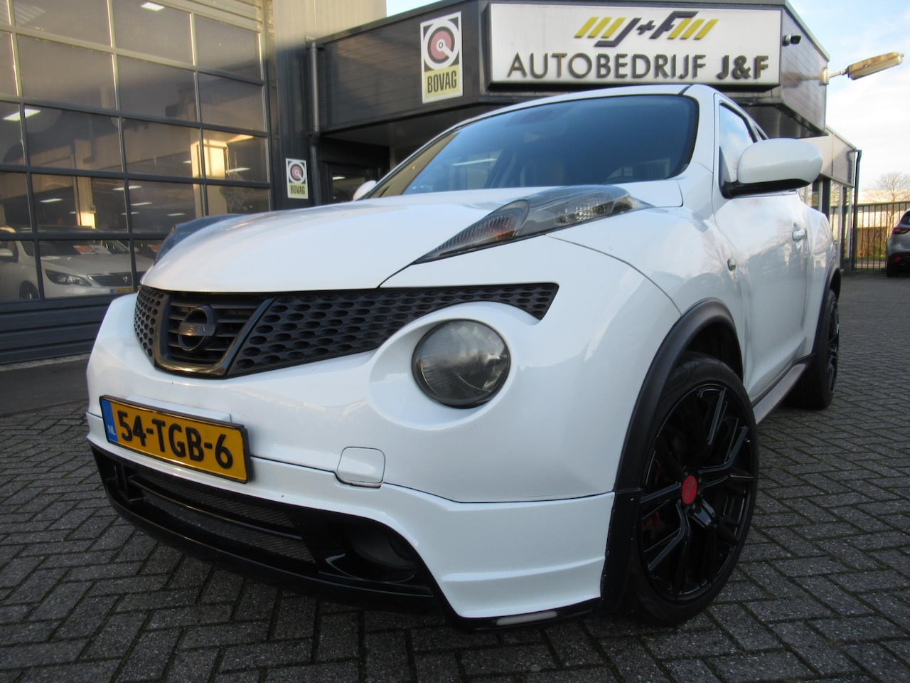 Nissan Juke - 1.6 Tekna / AUTOMAAT / Camera / Leder / Stoelverwarming - AutoWereld.nl
