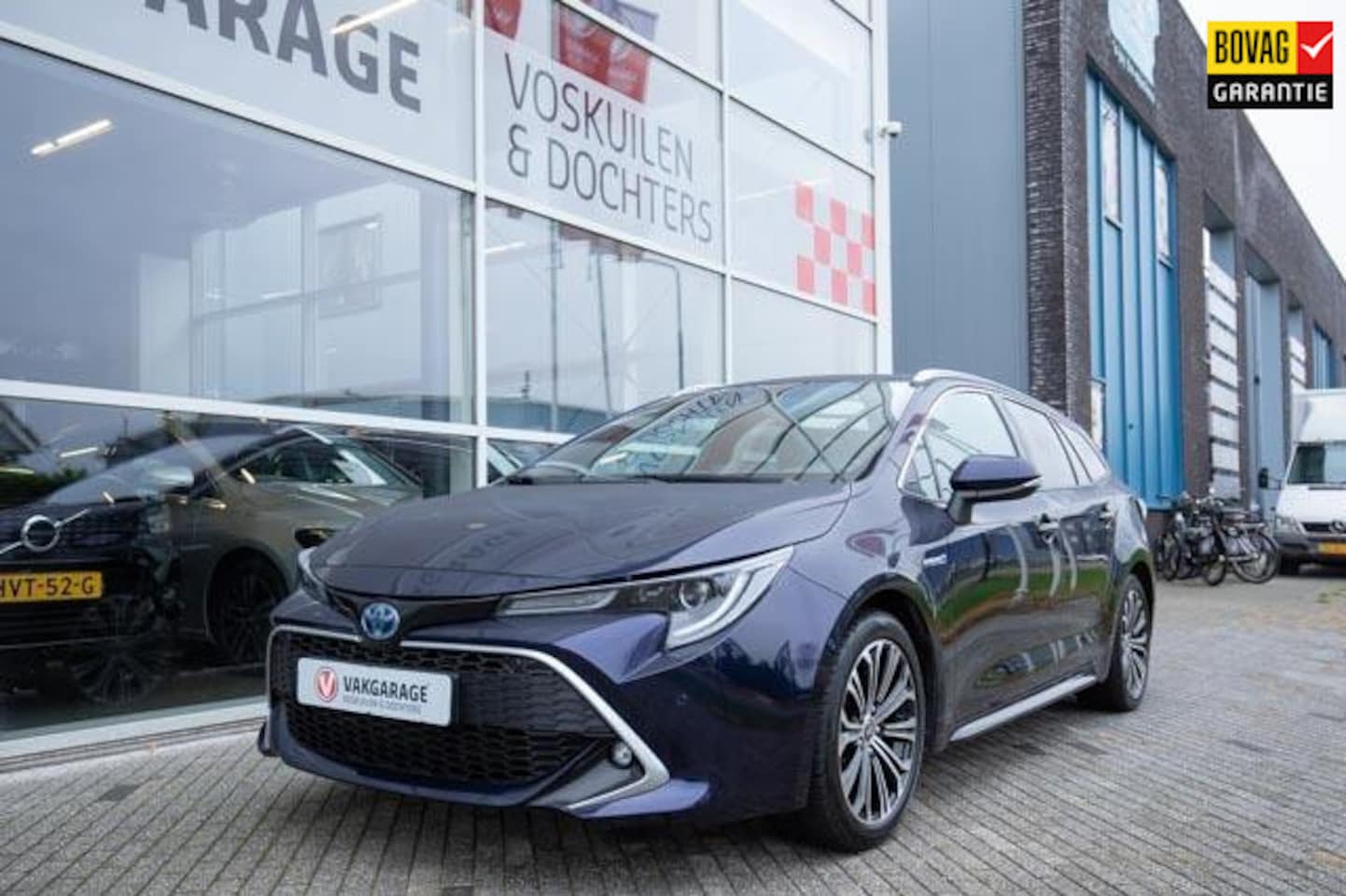 Toyota Corolla Touring Sports - 1.8 Hybrid Executive Premium - AutoWereld.nl