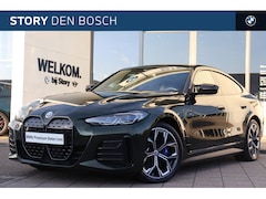BMW i4 - M50 High Executive / Sportstoelen / M Adaptief onderstel / Laserlight / Parking Assistant