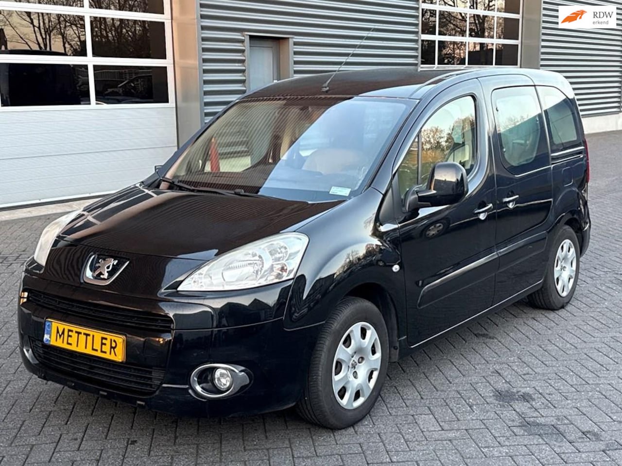 Peugeot Partner Tepee - 1.6 Première 1.6 Première,5 persoons, airco, trekhaak - AutoWereld.nl