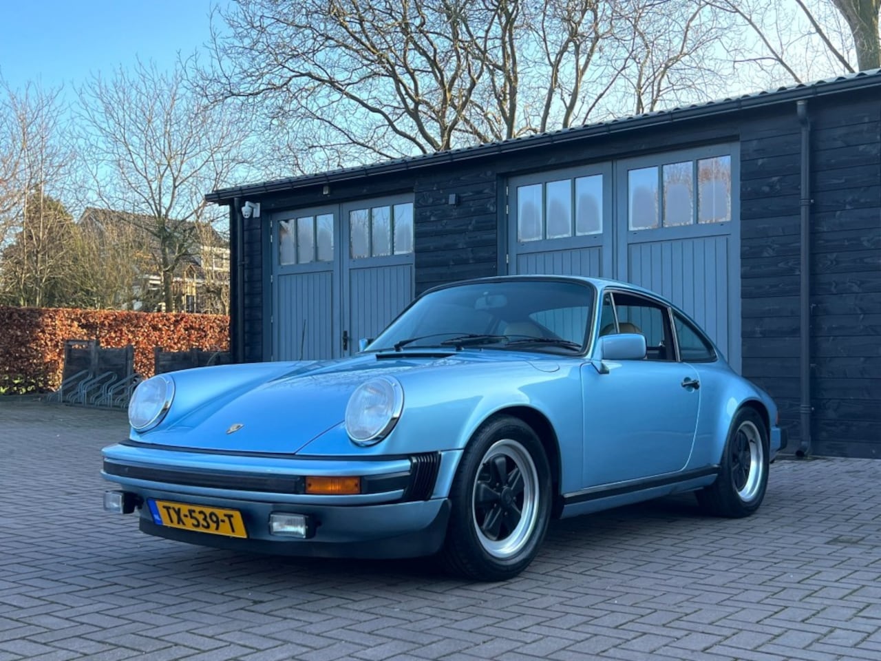 Porsche 911 - SC Coupe Hell blue Metallic - AutoWereld.nl