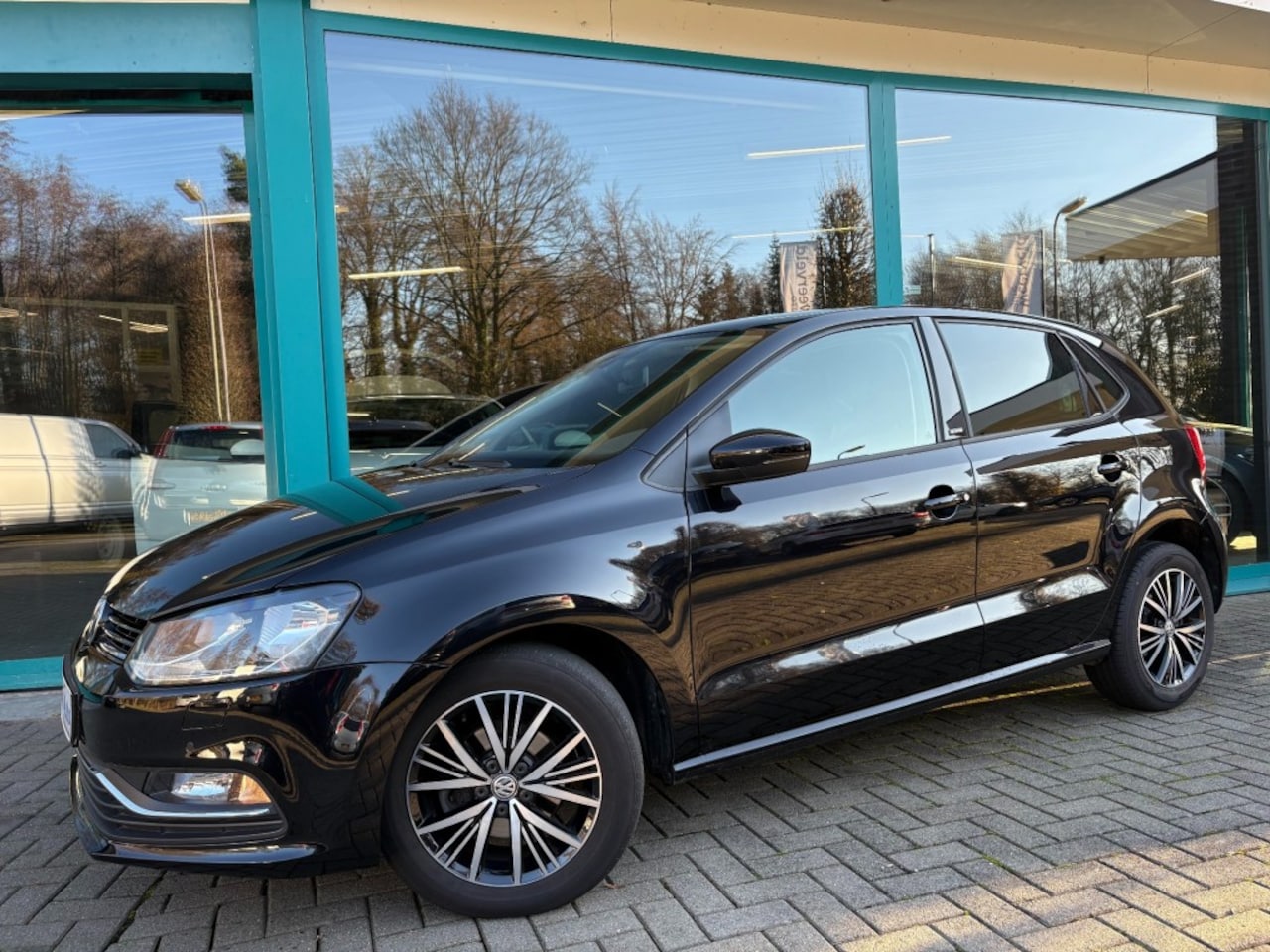 Volkswagen Polo - 1.2 TSI Highline Climate, PDC, Stoelverwarming - AutoWereld.nl