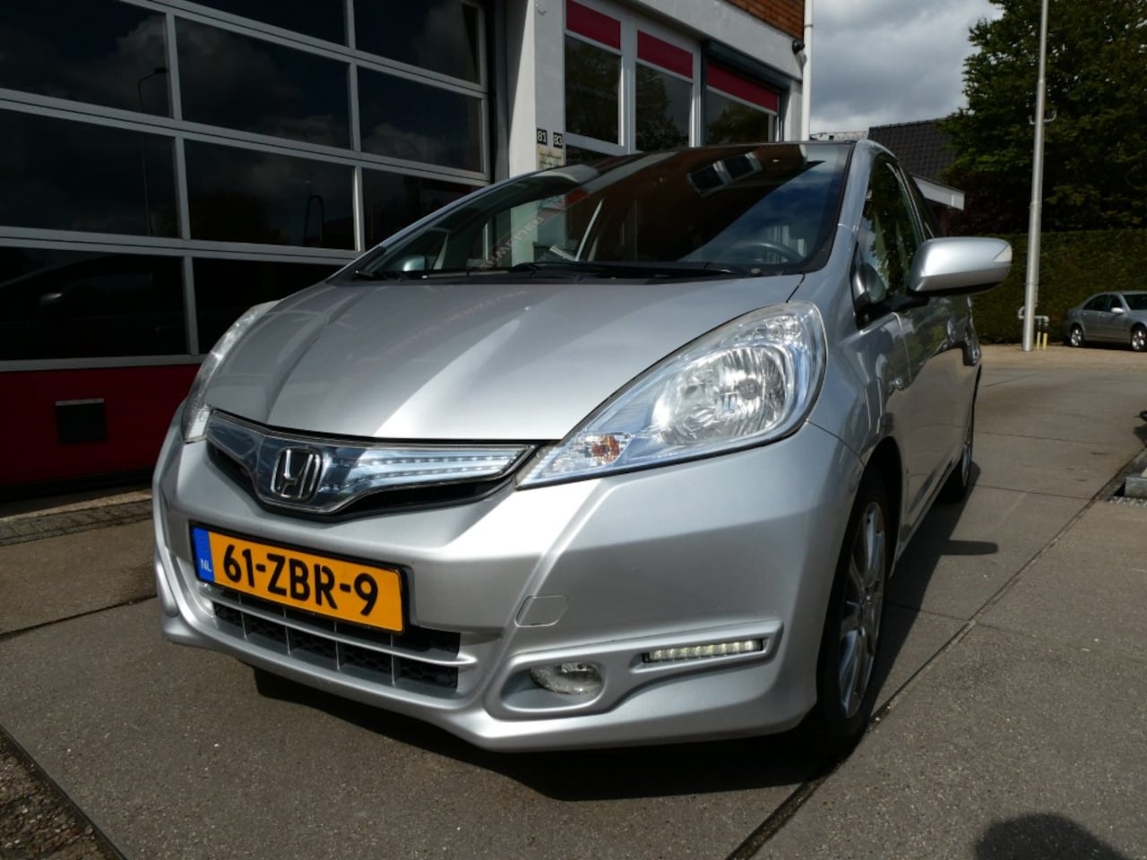 Honda Jazz - 1.4 HYBRID ELEGANCE panodak/cruise/navi/airco/pdc - AutoWereld.nl