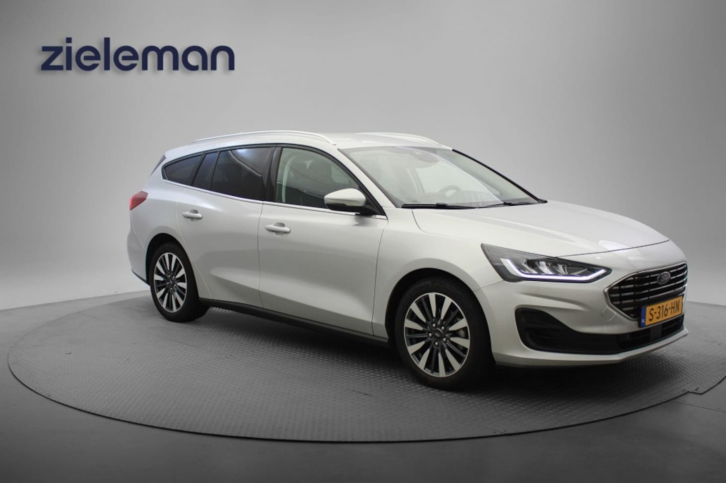 Ford Focus Wagon - 1.0 EcoBoost Hybrid Titanium X wagon - Carplay, Navi, Cruise, Camera - AutoWereld.nl