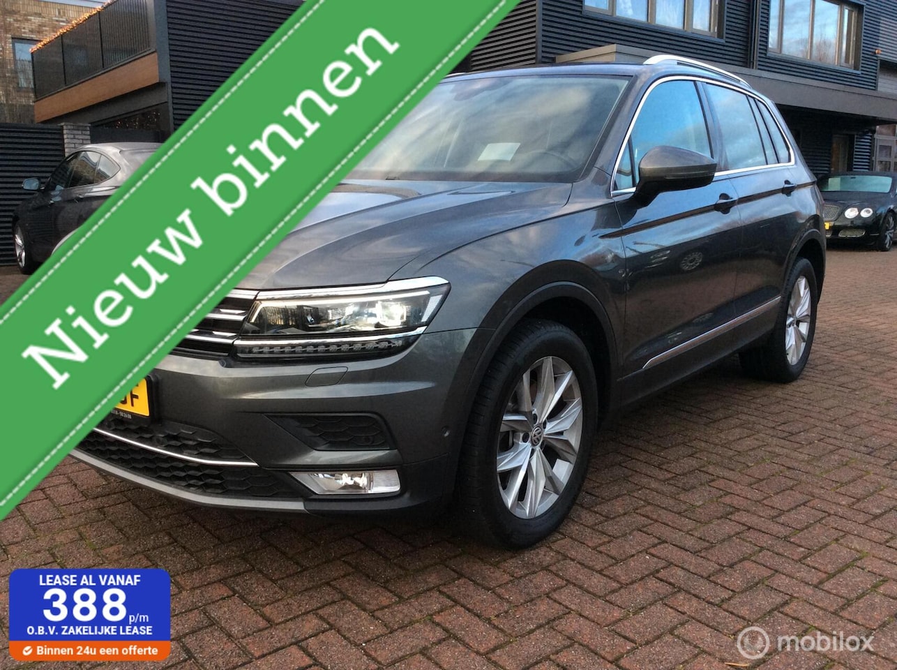 Volkswagen Tiguan - 2.0 TSI 4Motion Highline Automaat Head up Leder - AutoWereld.nl