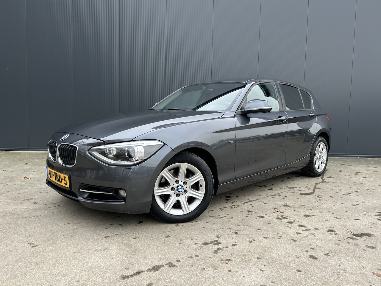 BMW 1-serie - 118i AUTOMAAT XENON NAVI AIRCO - AutoWereld.nl