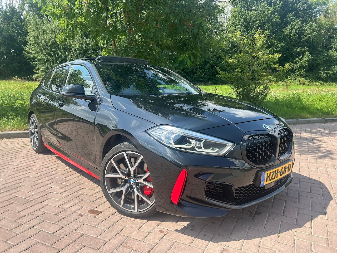 BMW 1-serie - 128ti Executive PANO | Apple Carplay | M-Sport - AutoWereld.nl