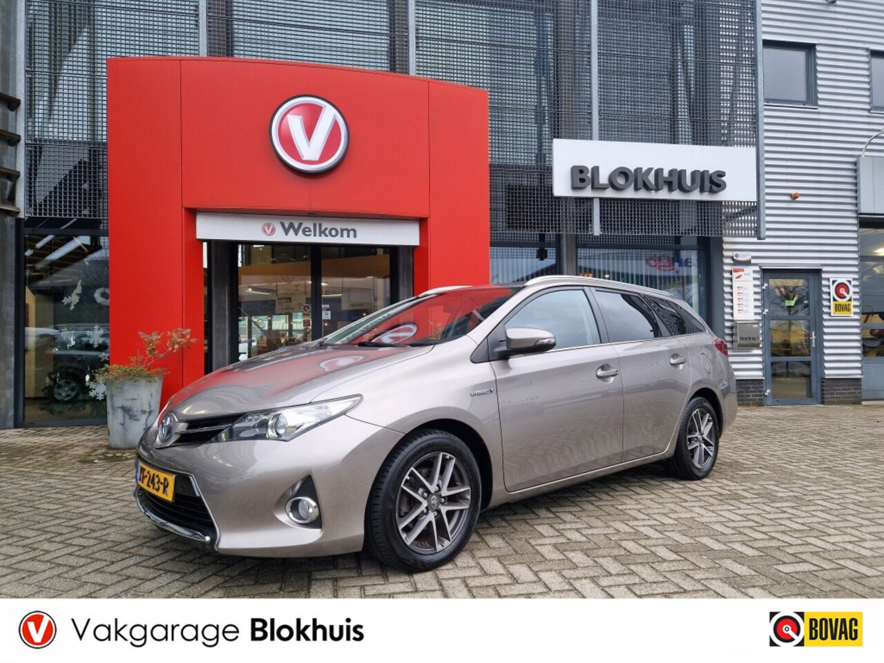 Toyota Auris Touring Sports - 1.8 Hybrid Dynamic | Navi | LMV | Cruise - AutoWereld.nl