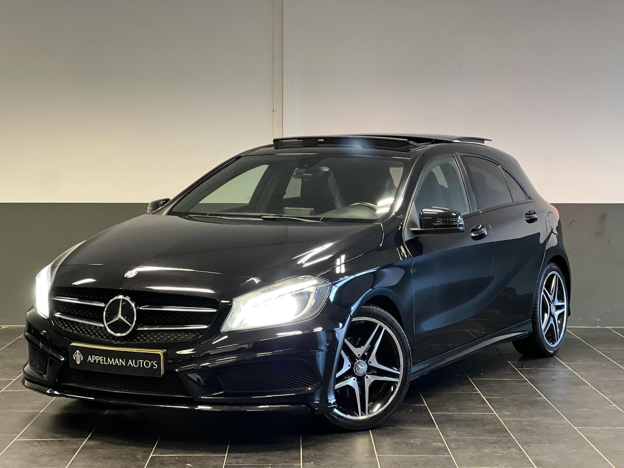 Mercedes-Benz A-klasse - 180 Ambition AMG Night|NAP|Pano|PDC| - AutoWereld.nl