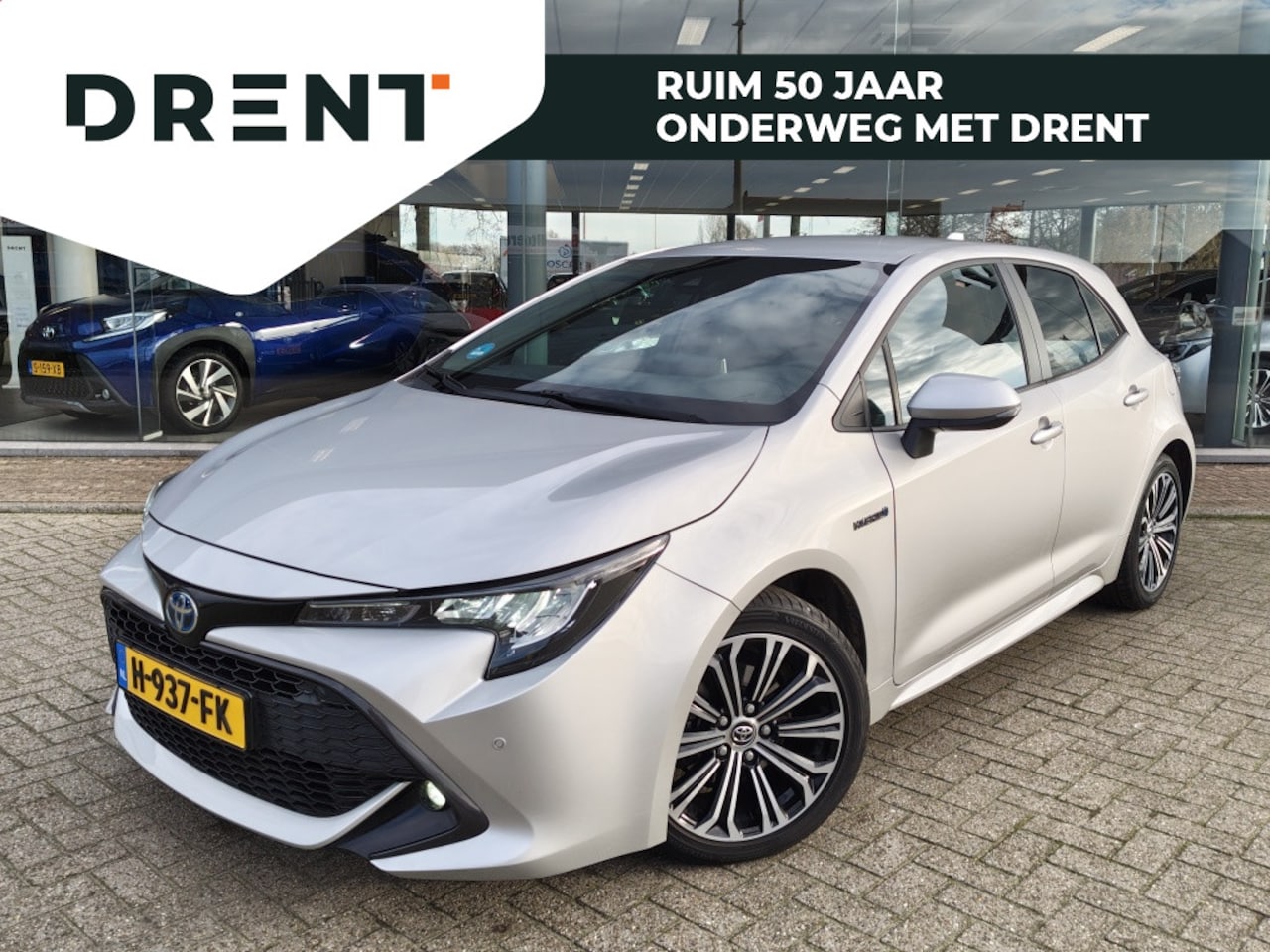 Toyota Corolla - 1.8 Hybrid Dynamic | Sensoren voor | Stoelverwarming | Android A - AutoWereld.nl
