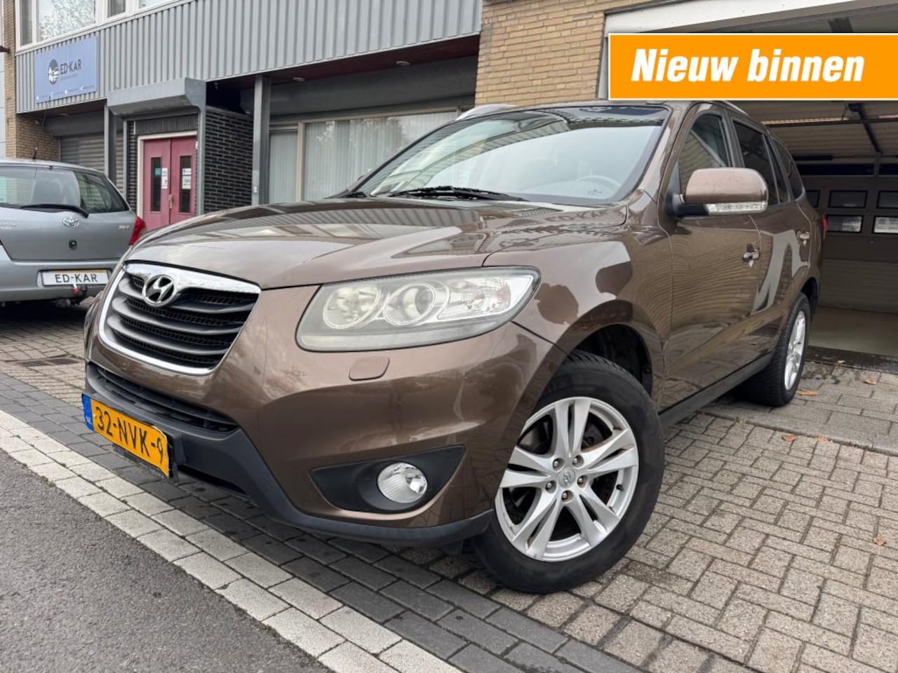 Hyundai Santa Fe - 2.4i CVVT 4WD Style CLIMA LEER DAK NETTE AUTO NAP APK 12-2026 - AutoWereld.nl