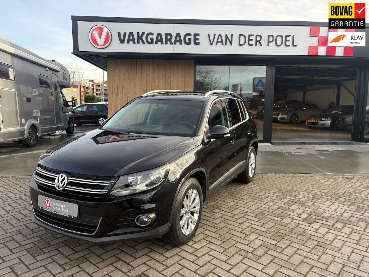 Volkswagen Tiguan - 1.4 TSI Sport&Style 4Motion - AutoWereld.nl