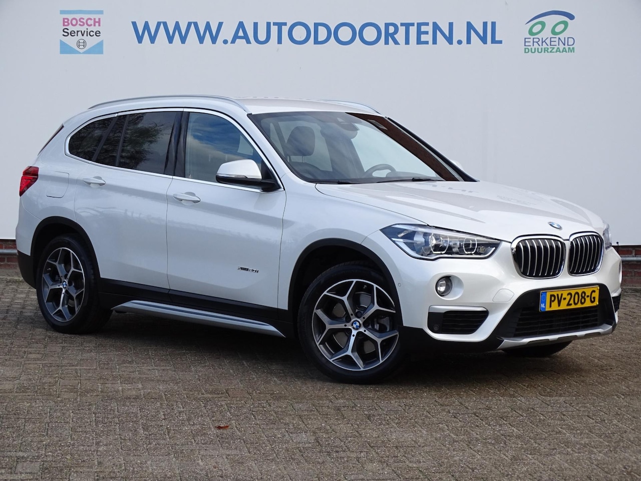 BMW X1 - XDrive20i High Executive|2000KG TREKKRACHT| - AutoWereld.nl