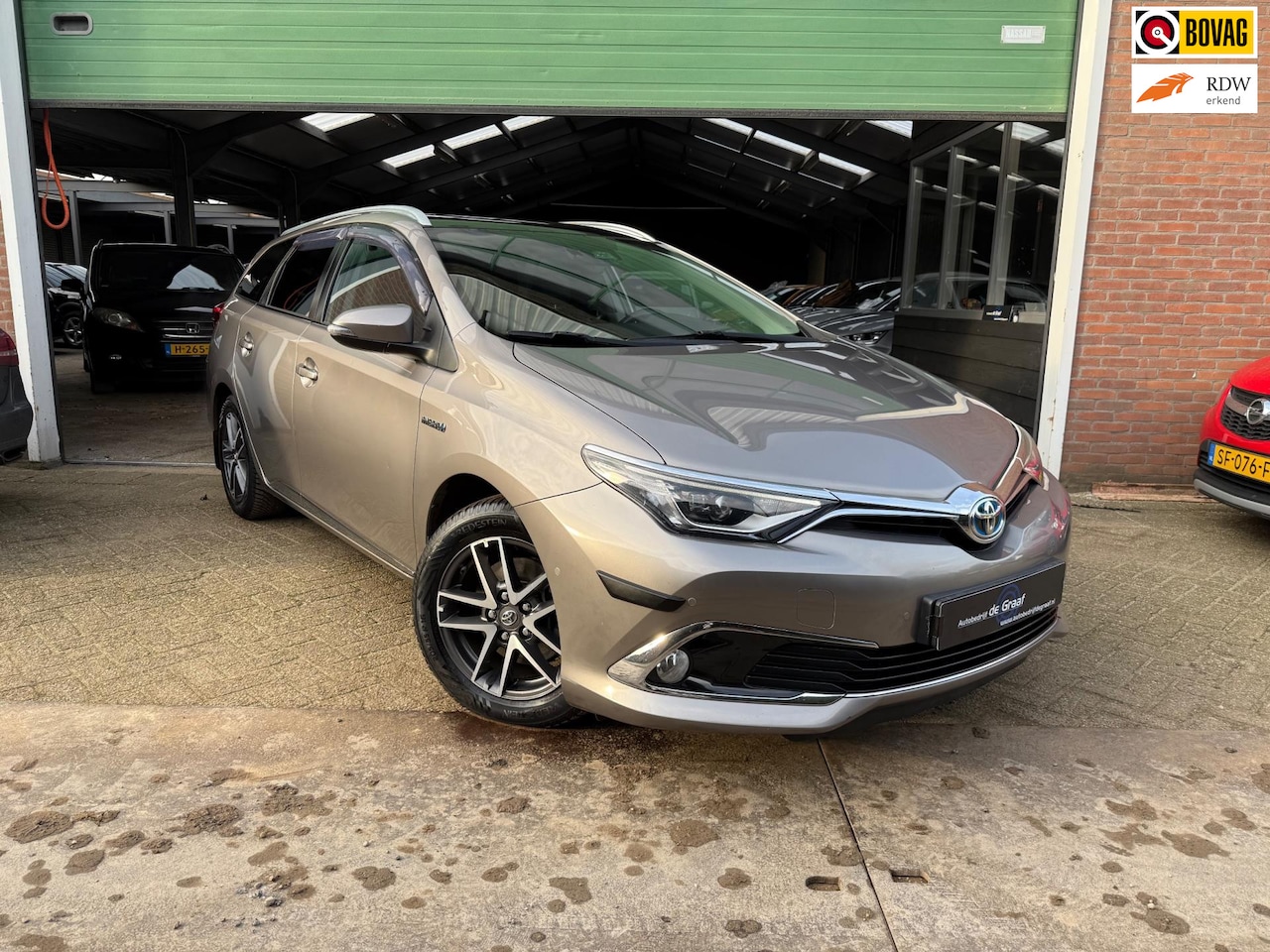 Toyota Auris Touring Sports - 1.8 Hybrid |PANO/TRHK/NAVI/PDC/CLIMA/VOL| - AutoWereld.nl