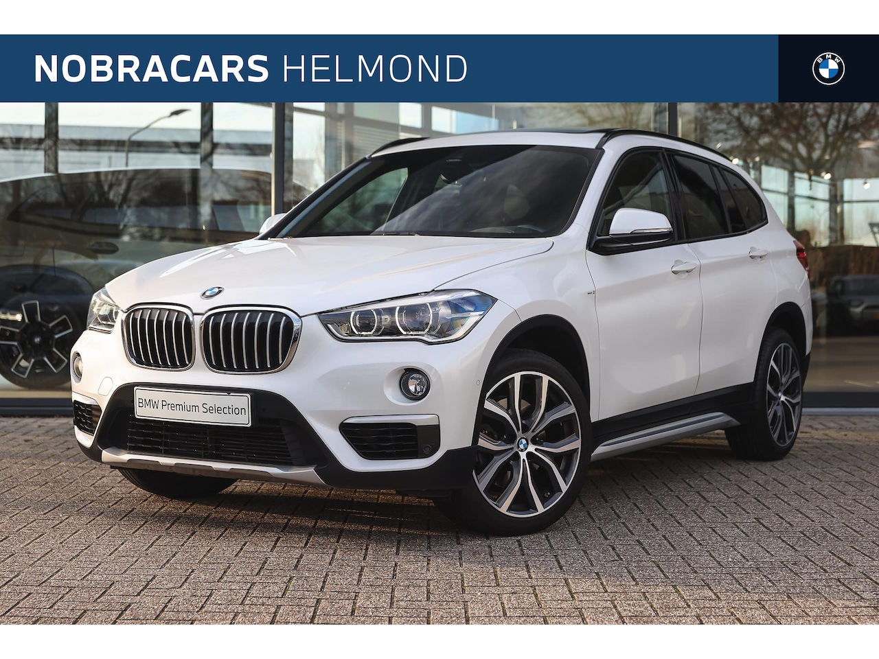 BMW X1 - sDrive20i High Executive xLine Automaat / Panoramadak / Trekhaak / Sportstoelen / Adaptief - AutoWereld.nl