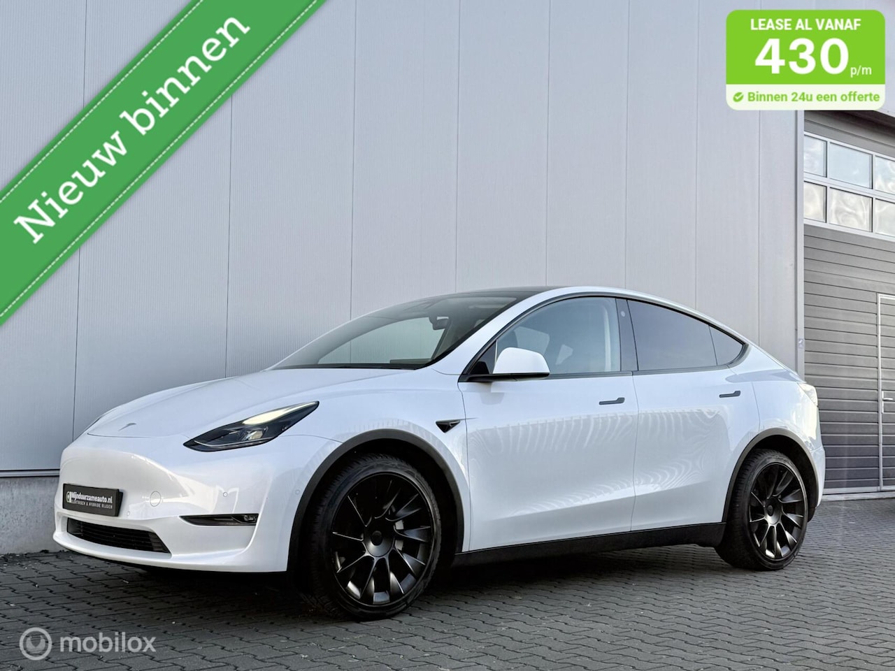 Tesla Model Y - Long Range AWD 75 kWh - SOH 92 % - Trekhaak - AutoWereld.nl