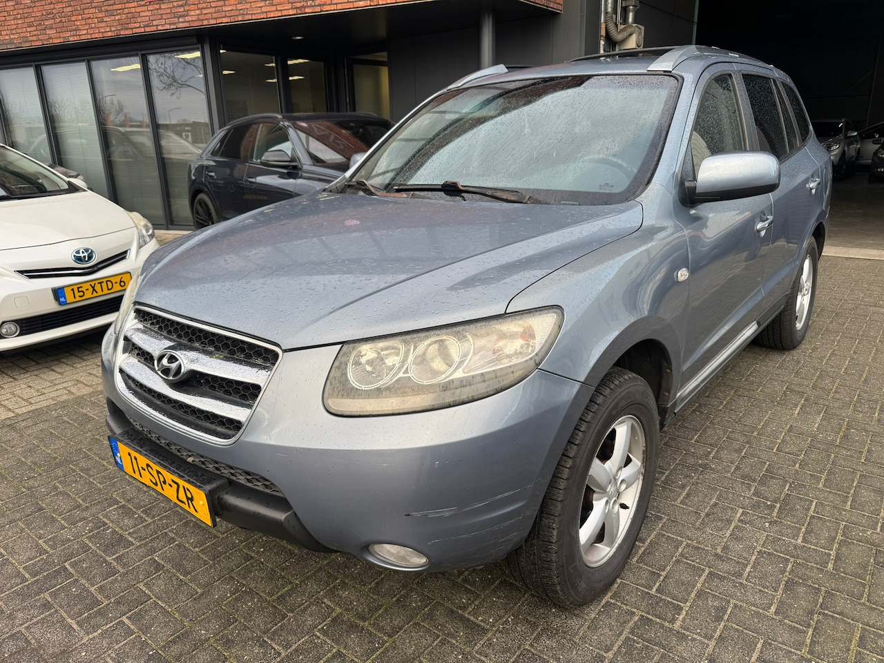 Hyundai Santa Fe - 2.7i V6 4WD Style 7p. AUTOMAAT LEDER CARPLAY - AutoWereld.nl