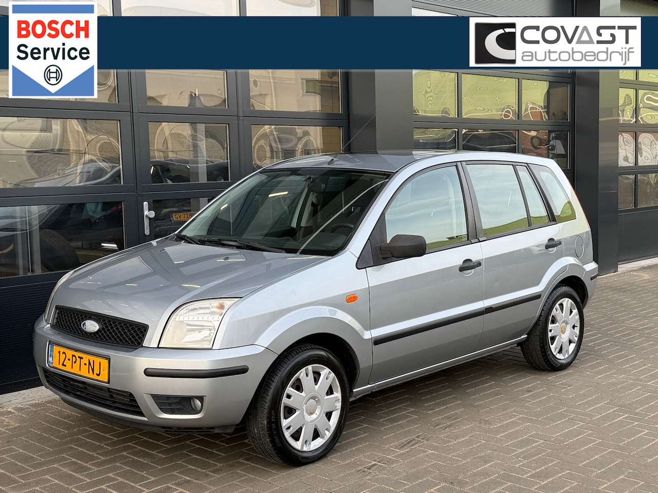 Ford Fusion - 1.6-16V Trend 75d.km Airco|Schuifdak|Parkeersensoren - AutoWereld.nl