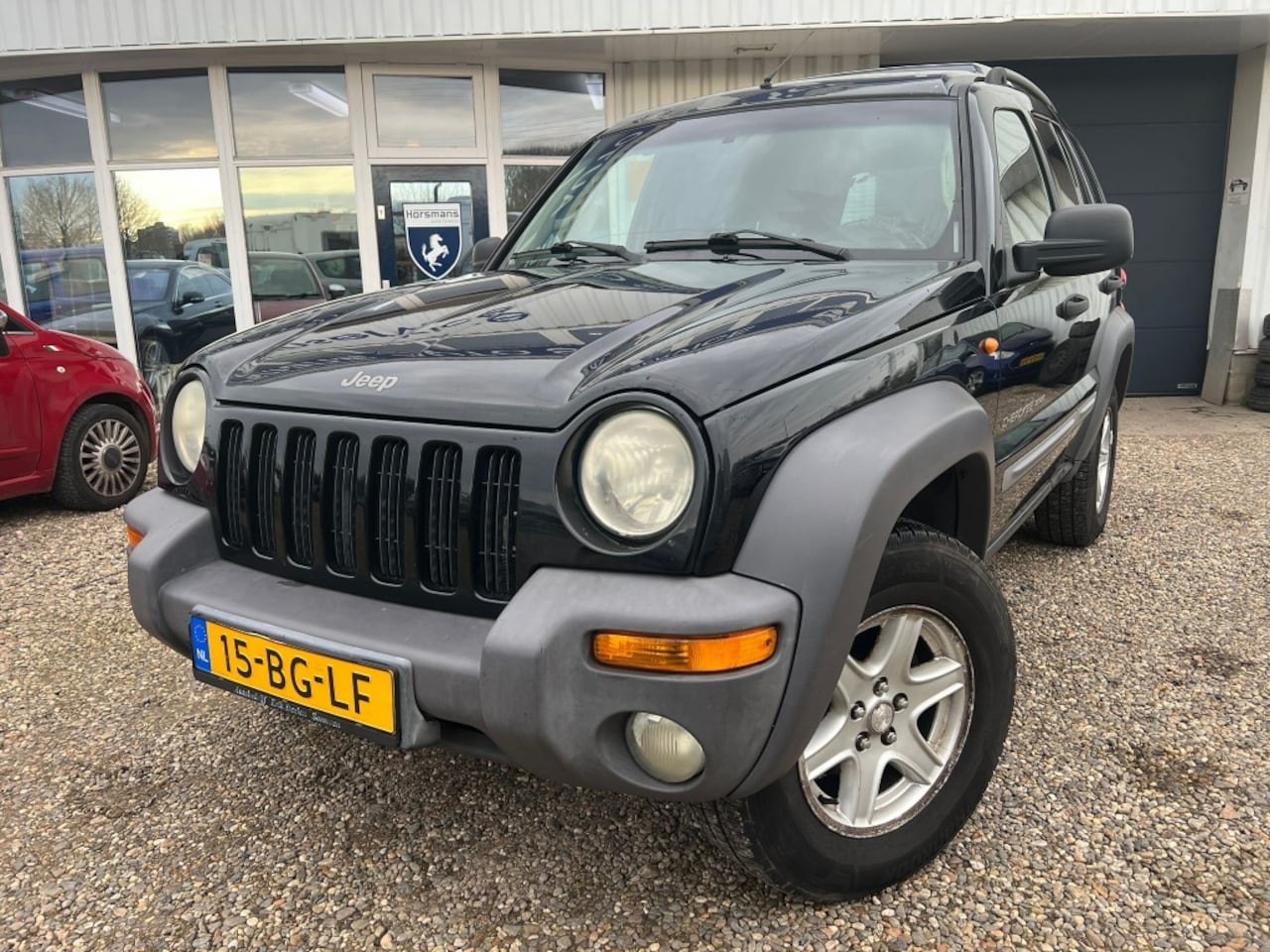 Jeep Cherokee - 2.5 CRD Sport Pl. HR - AutoWereld.nl