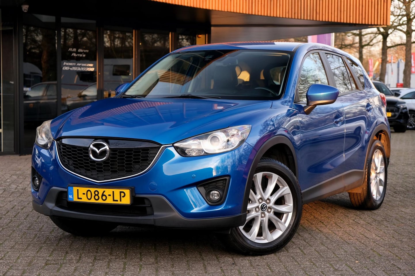 Mazda CX-5 - 2.0 4WD Rijklaar! Camera Stoelverwarming Trekhaak Keyless Leder Carplay/AndroidAuto - AutoWereld.nl