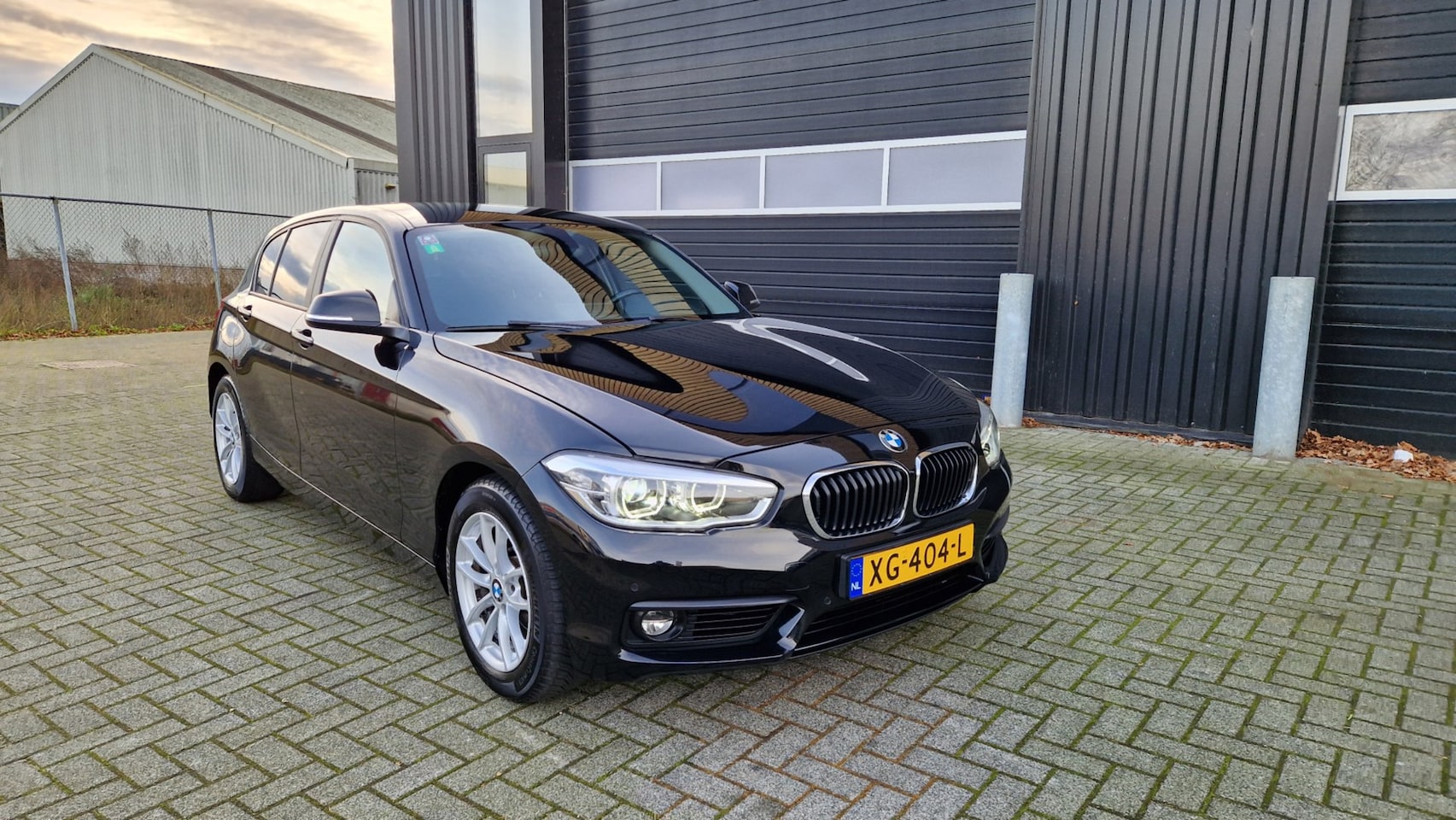 BMW 1-serie - 118i Executive Airco/Navi/Xenon - AutoWereld.nl