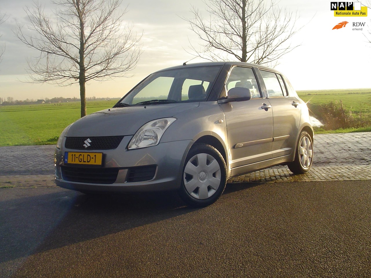 Suzuki Swift - 1.3 Comfort / Airco / NAP / Trekhaak - AutoWereld.nl