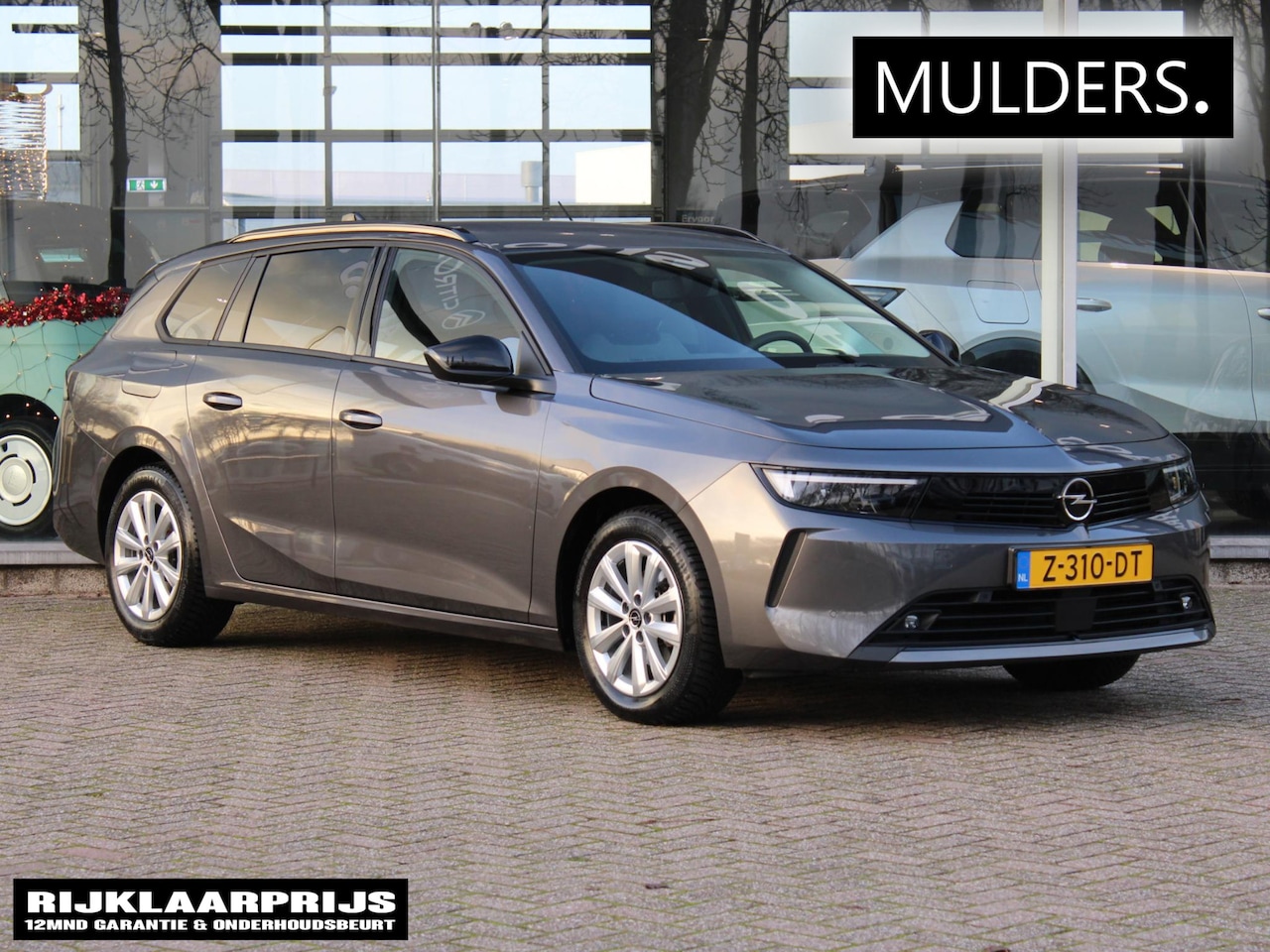 Opel Astra Sports Tourer - 1.2 Turbo | Camera / Navi / Trekhaak / Stoelverw. / Adapt. Cruise - AutoWereld.nl