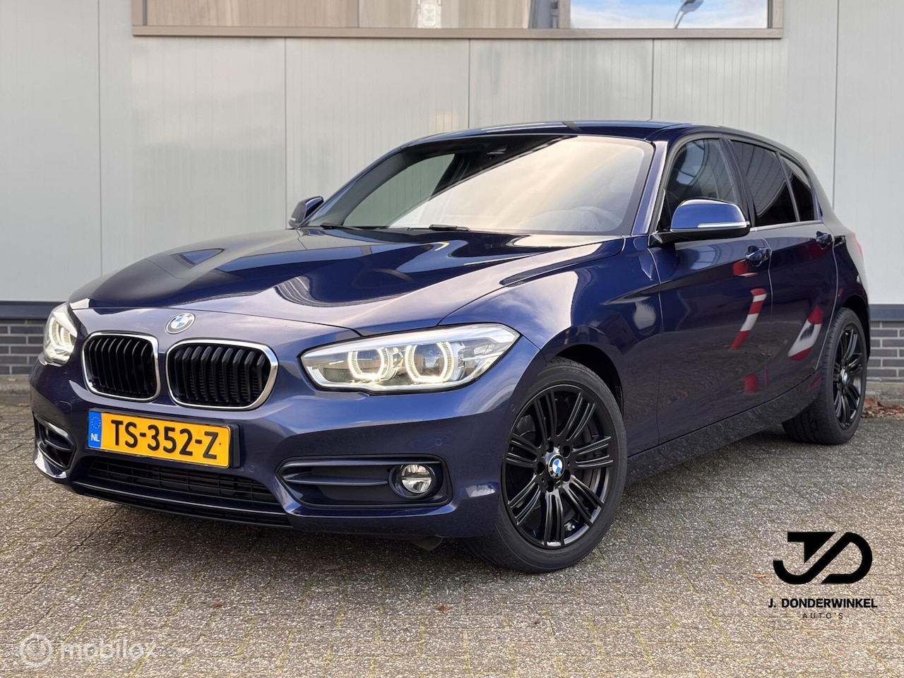BMW 1-serie - 118i AUT Sport Line Leder Camera Navi DEALER OH. - AutoWereld.nl