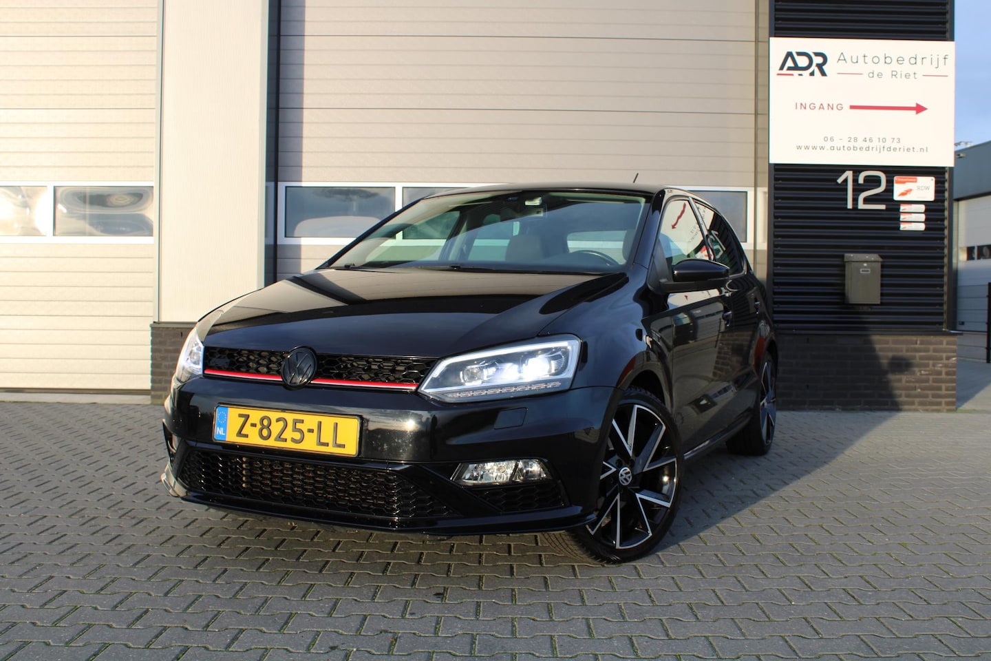 Volkswagen Polo - 1.4-16V TEAM / XENON/NAVI/CRUISE/17''/STOELVERWARMING /VOLL - AutoWereld.nl
