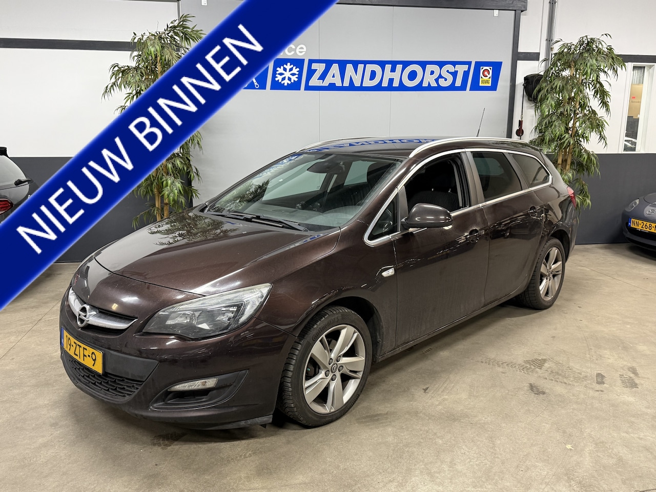 Opel Astra Sports Tourer - 1.4 Turbo Sport // Airco // Trekhaak - AutoWereld.nl