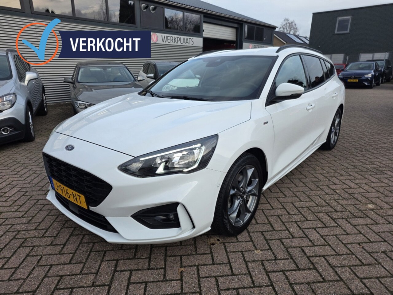 Ford Focus Wagon - 1.0 EBH hybrid ST Line. Trekhaak, navi. - AutoWereld.nl