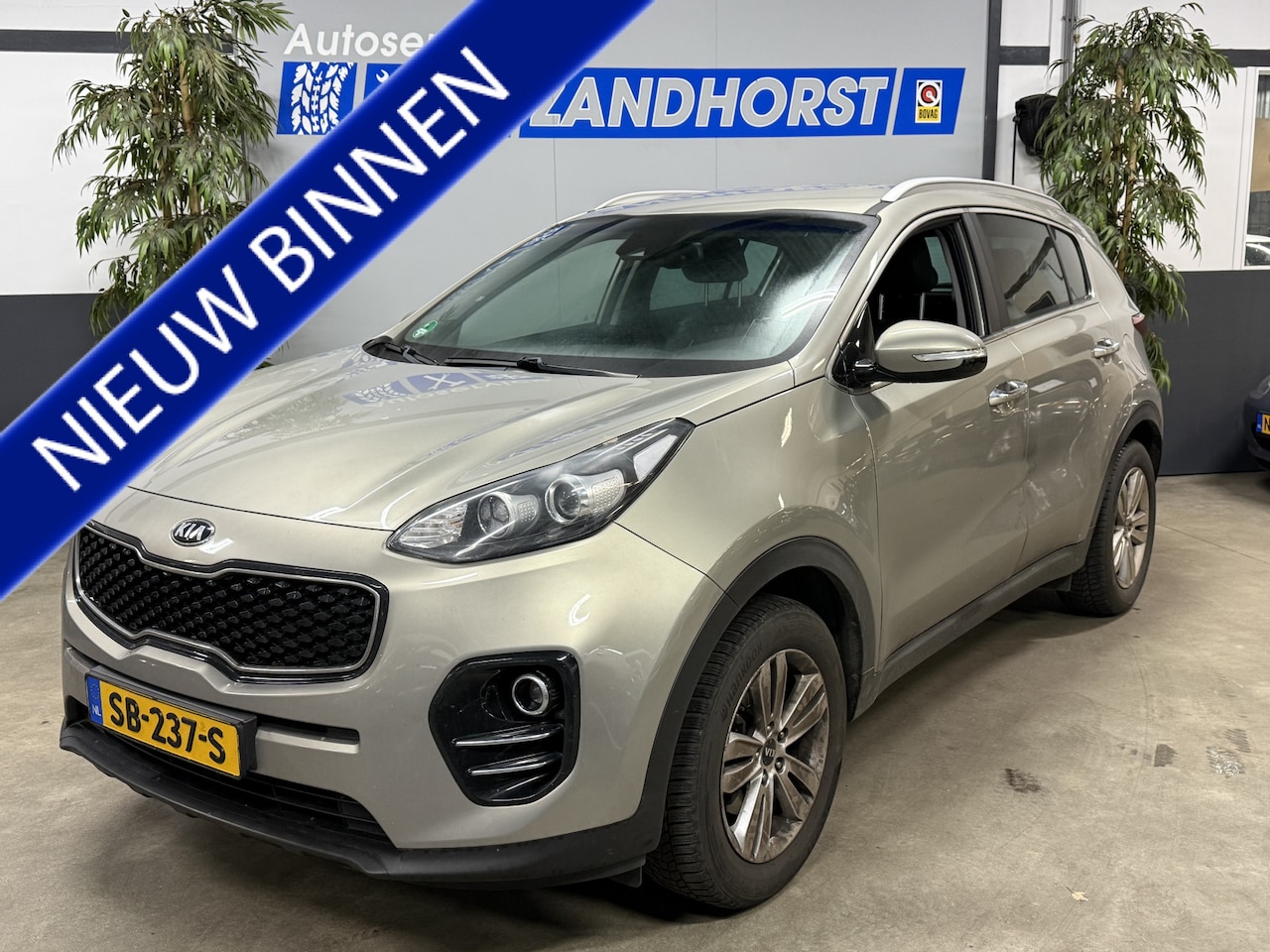 Kia Sportage - 1.6 GDI DynamicLine // Leer // Navi // Trekhaak - AutoWereld.nl