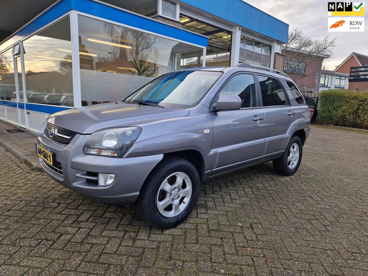 Kia Sportage - 2.0 CVVT X-cite | Airco | PDC | Elektr. ramen | Trekhaak - AutoWereld.nl